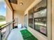 Small balcony with artificial turf and storage at 902 Charo Pkwy # 624, Davenport, FL 33897