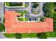 Top-down view of building, parking, and landscaping at 902 Charo Pkwy # 624, Davenport, FL 33897
