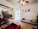 Bedroom with twin bed, dresser, and mirrored closet at 902 Charo Pkwy # 624, Davenport, FL 33897