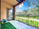 Private balcony overlooking green space at 902 Charo Pkwy # 624, Davenport, FL 33897