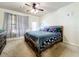 Large bedroom with a king-size bed and ceiling fan at 902 Charo Pkwy # 624, Davenport, FL 33897