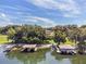 Two covered boat slips on a peaceful lakefront at 121 E Lake Summit Dr, Winter Haven, FL 33884