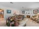 Spacious living room featuring a fireplace and comfortable seating at 121 E Lake Summit Dr, Winter Haven, FL 33884