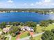 Lakefront home with large yard, pool, and dock access at 121 E Lake Summit Dr, Winter Haven, FL 33884