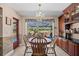 Kitchen with breakfast nook overlooking the pool at 121 E Lake Summit Dr, Winter Haven, FL 33884