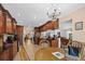 Spacious kitchen with wood cabinets, granite counters, and breakfast nook at 121 E Lake Summit Dr, Winter Haven, FL 33884