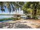 Covered boat lift on the lake with two boat slips at 121 E Lake Summit Dr, Winter Haven, FL 33884