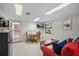 Small kitchenette with dining table and comfortable seating at 121 E Lake Summit Dr, Winter Haven, FL 33884