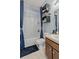 Bathroom with tub shower combo and a single vanity at 2158 Mirasol Dr, Winter Haven, FL 33881