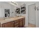 Double vanity bathroom with access to a toilet and more at 2158 Mirasol Dr, Winter Haven, FL 33881