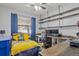 Cozy bedroom featuring a built-in workspace and plenty of storage at 2158 Mirasol Dr, Winter Haven, FL 33881
