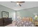 Bedroom with a king-size bed and dresser at 2158 Mirasol Dr, Winter Haven, FL 33881