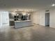 Open concept kitchen with island and stainless steel appliances at 177 Cimarron Ln, Kissimmee, FL 34759