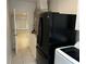 Laundry room with washer, dryer, and access to other areas at 177 Cimarron Ln, Kissimmee, FL 34759