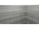 Walk-in pantry with wire shelving at 177 Cimarron Ln, Kissimmee, FL 34759