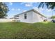 Large backyard with grassy area and privacy fence at 2158 Mirasol Dr, Winter Haven, FL 33881