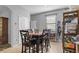 Bright breakfast nook with table and chairs, adjacent to kitchen at 2158 Mirasol Dr, Winter Haven, FL 33881