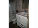 Bathroom features a vanity with a sink and a toilet at 1815 Christy Ln, Lakeland, FL 33801