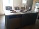 Kitchen island with sink and dishwasher at 1815 Christy Ln, Lakeland, FL 33801