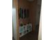 Entryway with decorative wall art and storage shelves at 1815 Christy Ln, Lakeland, FL 33801