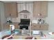 Modern kitchen with island and stainless steel appliances at 1815 Christy Ln, Lakeland, FL 33801