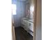 Double vanity bathroom with modern fixtures at 1815 Christy Ln, Lakeland, FL 33801