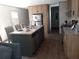Open concept kitchen with island and ample cabinet space at 1815 Christy Ln, Lakeland, FL 33801