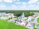 Aerial view of the house and surrounding community at 716 Challenger Ave, Davenport, FL 33897