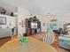 Light and airy dining area adjacent to the living room at 716 Challenger Ave, Davenport, FL 33897