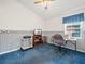 Home office features a desk, chair, and built-in shelving at 716 Challenger Ave, Davenport, FL 33897