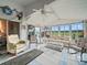 Relaxing sunroom with comfy seating and scenic views at 716 Challenger Ave, Davenport, FL 33897