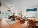 Spacious living room with a view to the lanai and backyard at 716 Challenger Ave, Davenport, FL 33897