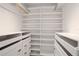 Large walk-in closet with ample shelving and drawers at 816 W Hancock St, Lakeland, FL 33803