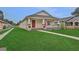 Charming house with front porch and manicured lawn at 816 W Hancock St, Lakeland, FL 33803
