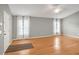 Bright living room with hardwood floors, neutral walls, and lots of natural light at 816 W Hancock St, Lakeland, FL 33803