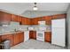Well-equipped kitchen, featuring wood cabinets and modern appliances at 816 W Hancock St, Lakeland, FL 33803