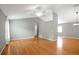 Spacious living room with hardwood floors and neutral walls at 816 W Hancock St, Lakeland, FL 33803