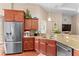 Modern kitchen featuring stainless steel appliances and granite countertops at 135 Eloise Oaks Dr, Winter Haven, FL 33884