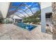 Expansive pool and spa with covered patio at 2931 Chickasaw Cir, Haines City, FL 33844