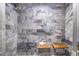 Modern steam shower with gray tile walls and built-in wooden seats at 2931 Chickasaw Cir, Haines City, FL 33844