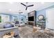 Spacious living room with sectional sofa and stone fireplace at 2931 Chickasaw Cir, Haines City, FL 33844