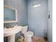 Simple yet functional bathroom with pedestal sink and toilet at 2931 Chickasaw Cir, Haines City, FL 33844