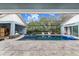 Inviting pool and spa area with a covered lanai at 2931 Chickasaw Cir, Haines City, FL 33844