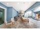 Outdoor kitchen with stainless steel appliances and dining area at 2931 Chickasaw Cir, Haines City, FL 33844