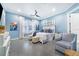 Serene bedroom with a king-size bed, light blue walls and a sitting area at 2931 Chickasaw Cir, Haines City, FL 33844