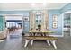 Farmhouse-style dining area with a wooden table and bench at 2931 Chickasaw Cir, Haines City, FL 33844