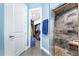 Bathroom with walk-in shower, large mirror and access to a large closet at 2931 Chickasaw Cir, Haines City, FL 33844