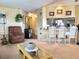 Open kitchen with breakfast bar and access to living area at 191 Sweet Cir, Winter Haven, FL 33884