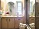 Clean bathroom with double sinks and shower at 191 Sweet Cir, Winter Haven, FL 33884