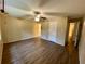 Bright bedroom with wood-look floors and ceiling fan at 1100 Martinique Dr # 208, Winter Haven, FL 33884